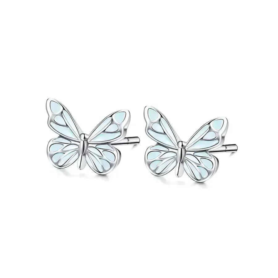 Luminous Blue Butterfly Earrings with silver-colored outlines and blue wings